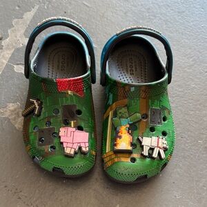 CROCS Kids Green Slippers with Fun Design